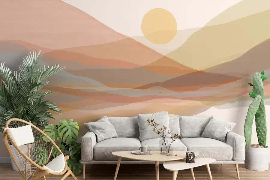 Wall Mural Photo Wallpaper Mountainous landscape with a warm sun in the sky, rolling hills in shades of orange, yellow, and brown w07976
