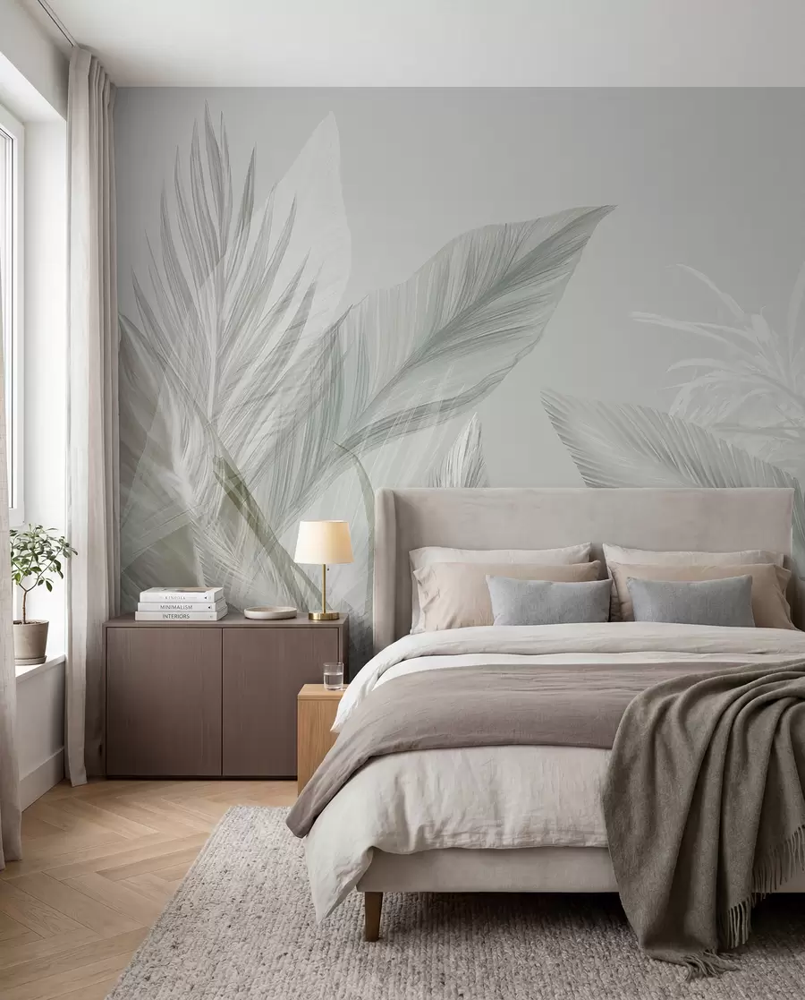 peintures murales Des plumes blanches, vertes et grises douces et des feuilles tropicales flottant sur un fond clair w08241