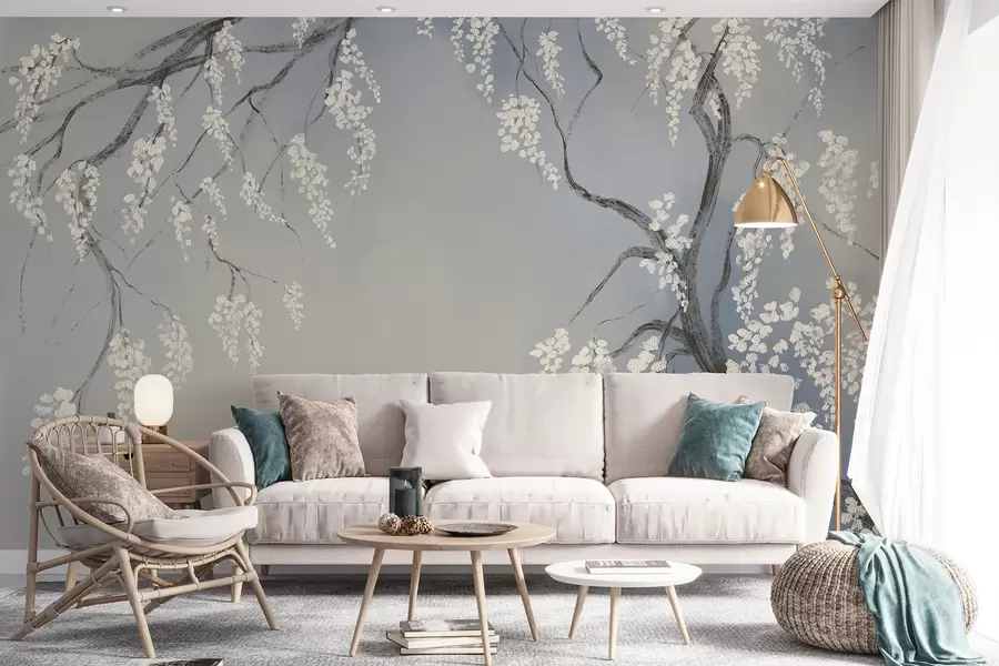 wall murals Delicate white cherry tree with blossom flowers blooming on branches against blue background w08243v1