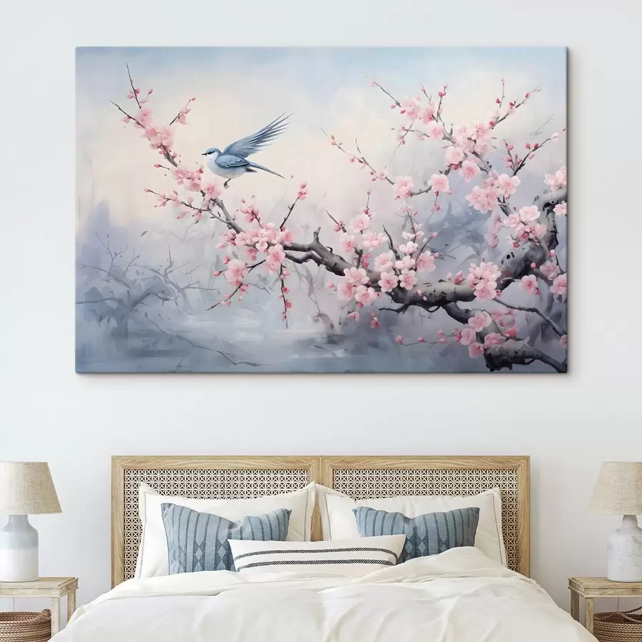 wall murals Blue bird flying among pink cherry blossom flowers on a misty spring muted background  s41712