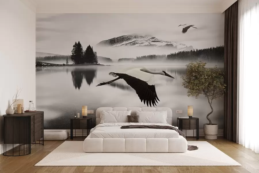 Wall Mural Photo Wallpaper A stork in flight over a river and mountains, black-and-white landscape with birds w08658