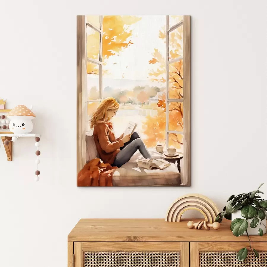 wall murals A girl reading a book by an open window in an autumn setting, with bright golden trees in the background and a cup of tea nearby s42572