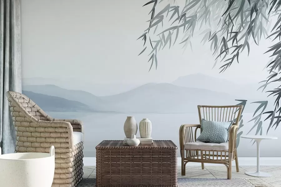 Wall Mural Photo Wallpaper Bamboo leaves hanging over a lake with mountains in the background, soft blue and white tones, ink wash painting style w09048