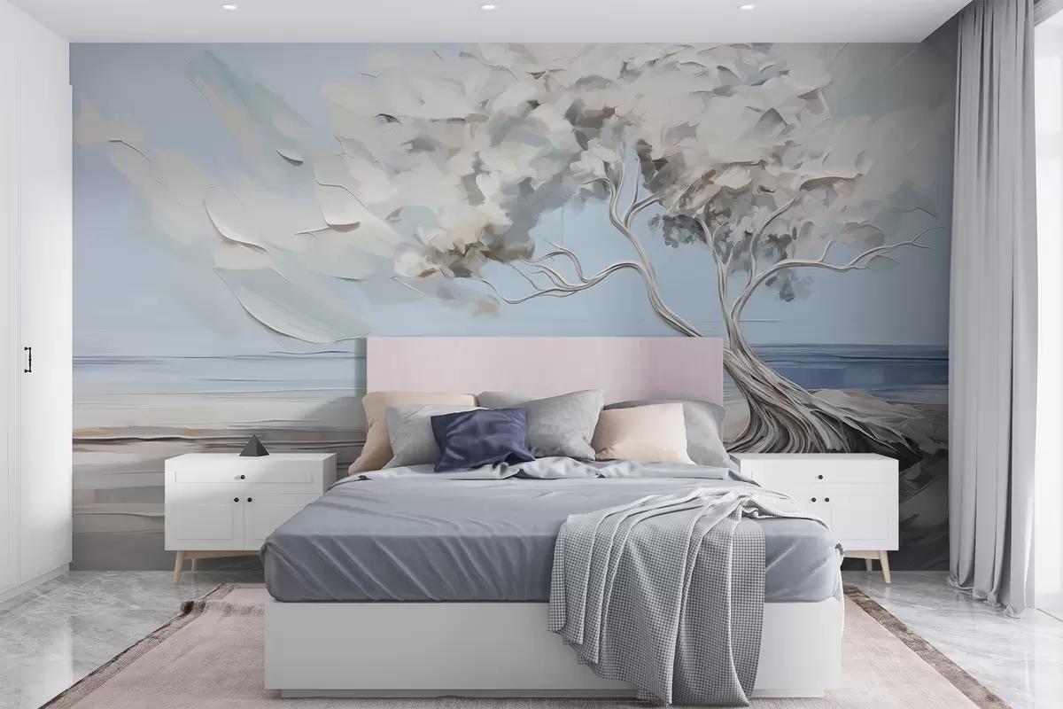 Wall Mural Photo Wallpaper A white tree with thick and textured leaves on a sandy beach, landscape with a light blue sky w09205