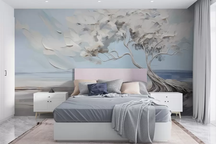 Wall Mural Photo Wallpaper A white tree with thick and textured leaves on a sandy beach, landscape with a light blue sky w09205