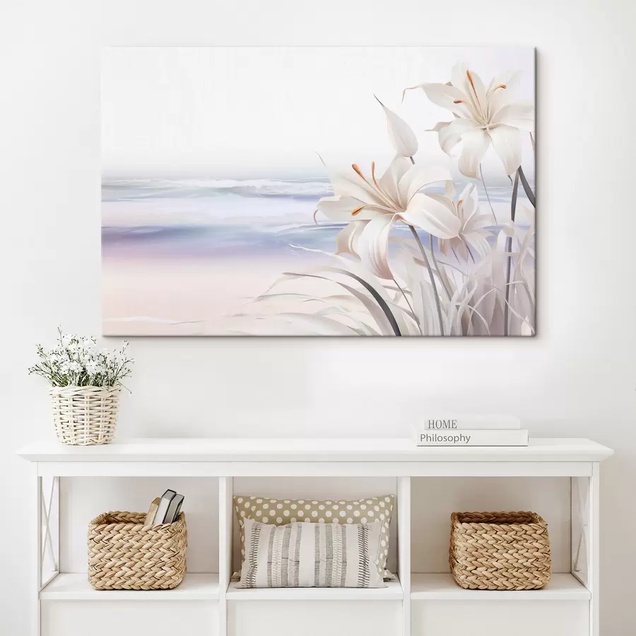 wall murals White lilies with orange pistils and long leaves on a beach with soft waves in the background, pastel colors s44850