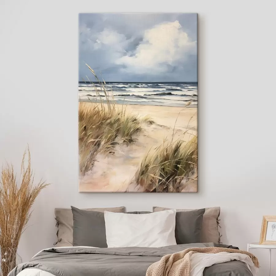 wall murals A sandy beach with tall grass in the foreground, the ocean with waves and a cloudy sky in the background s45173