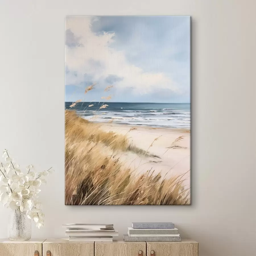 wall murals A sandy beach with tall grass in the foreground, the ocean with waves and a cloudy sky in the background s45174