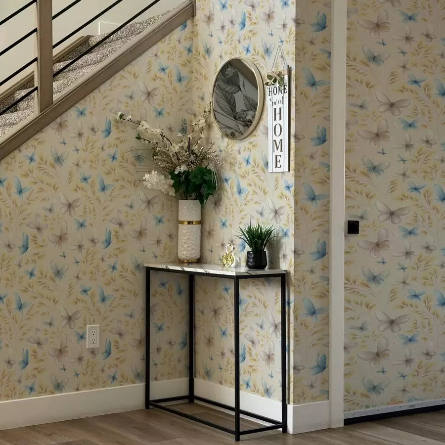 murales Mariposas ligeras entre hojas amarillas sobre un fondo claro. a00795