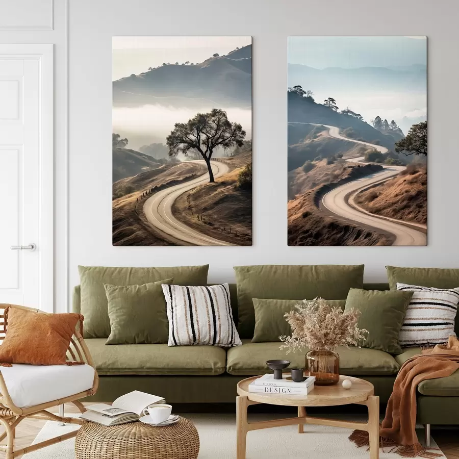 murales Una sinuosa carretera que atraviesa un paisaje montañoso con hierba seca bajo un cielo despejado y montañas en la distancia m00887