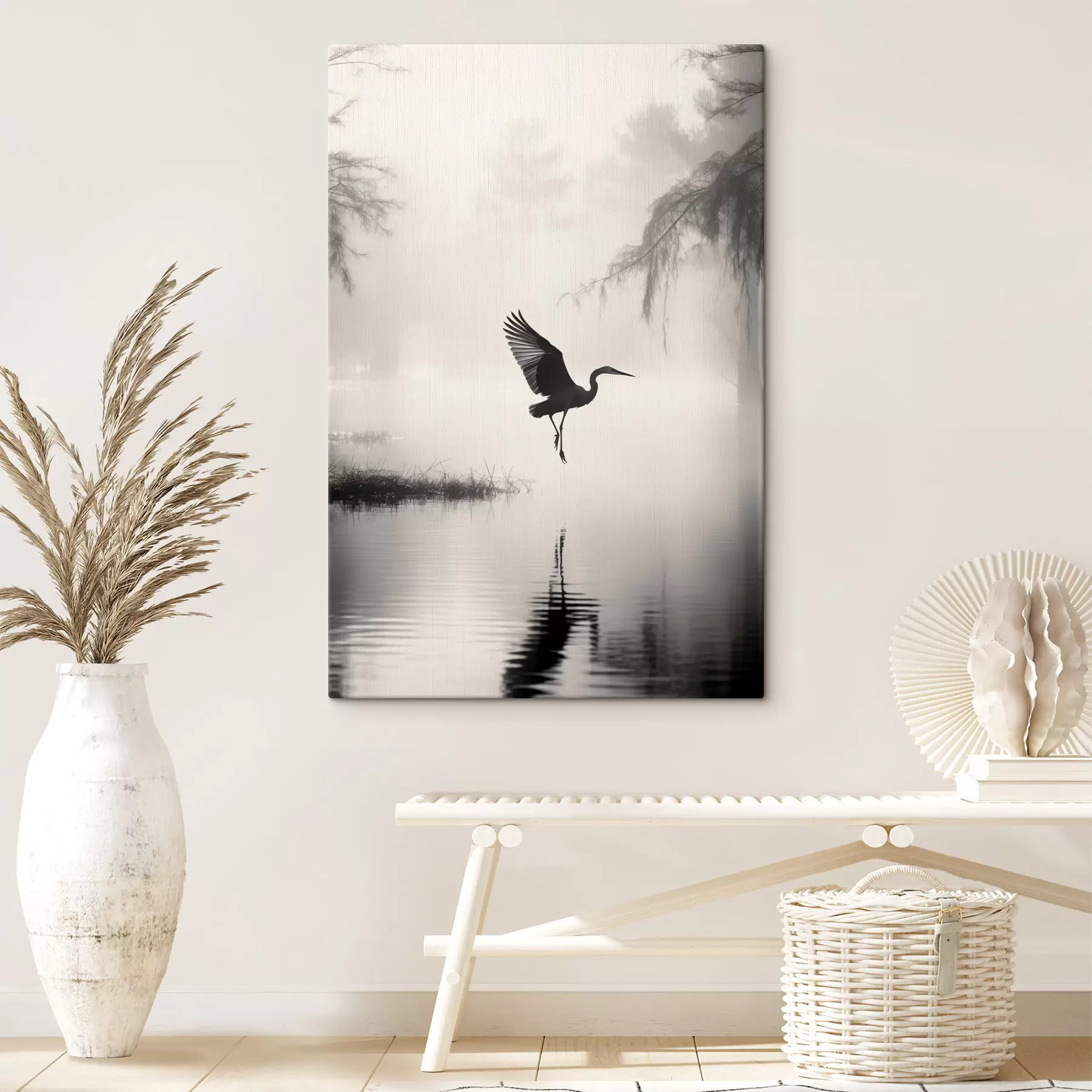 wall murals A white heron with its wings spread, flying near tall reeds, black and white minimalist composition s46694