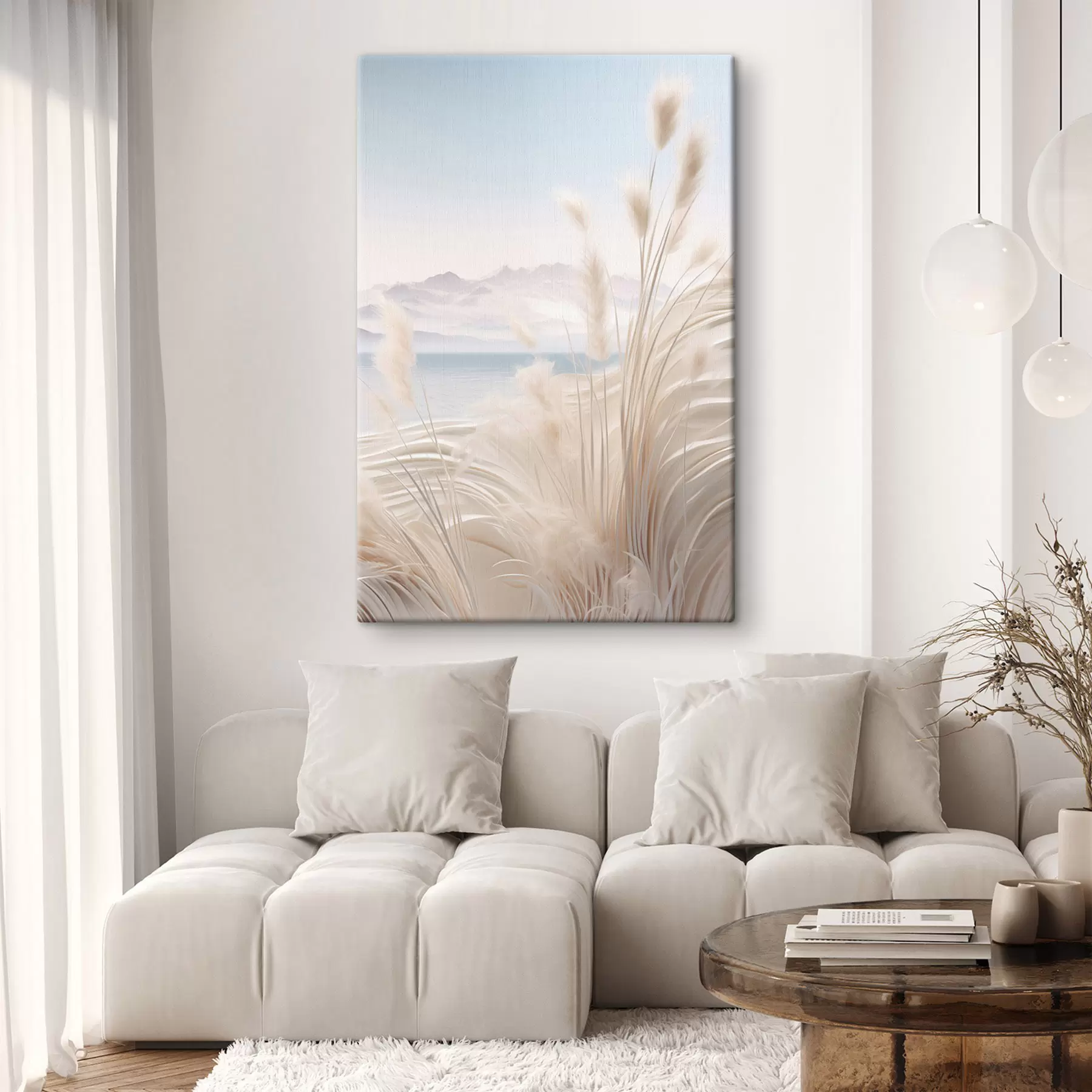 wall murals Tall, feathery pampas grass in soft beige tones, with a sandy beach and mountains in the background s47433