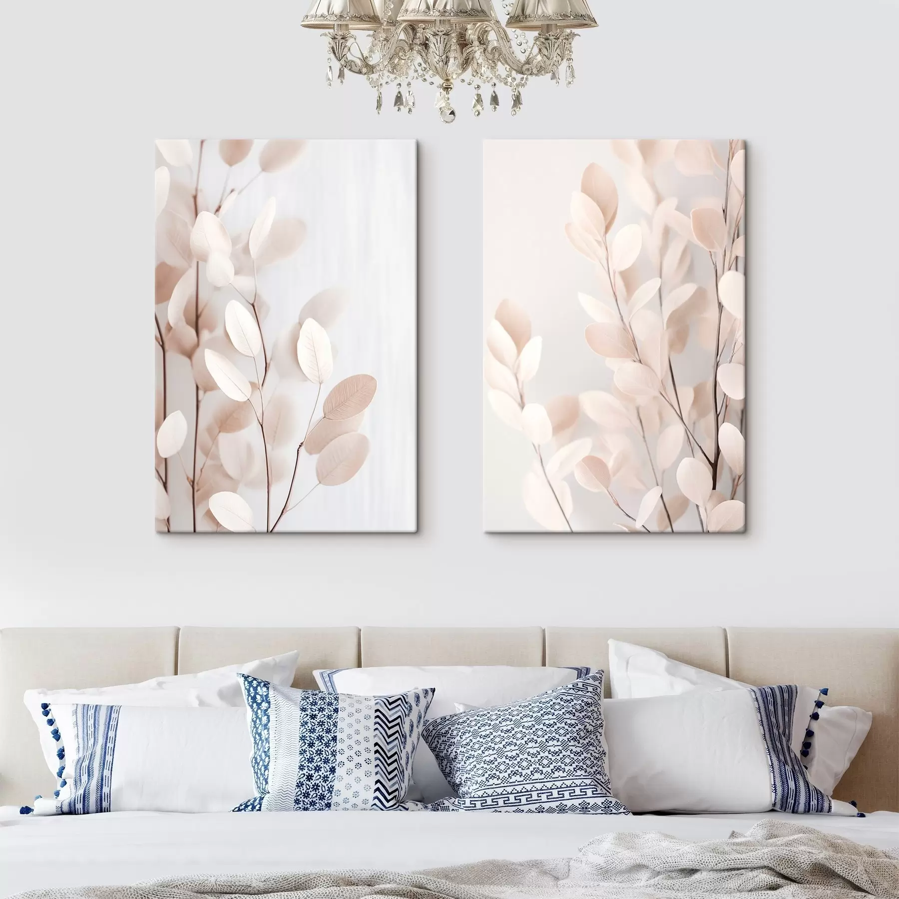 wall murals Pale beige eucalyptus leaves against a light, textured background m30692