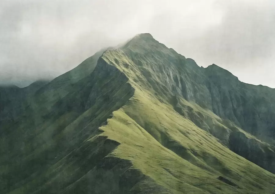 Wall Mural Photo Wallpaper Mountain malachite with green slopes and a peak wrapped in soft mist w05820
