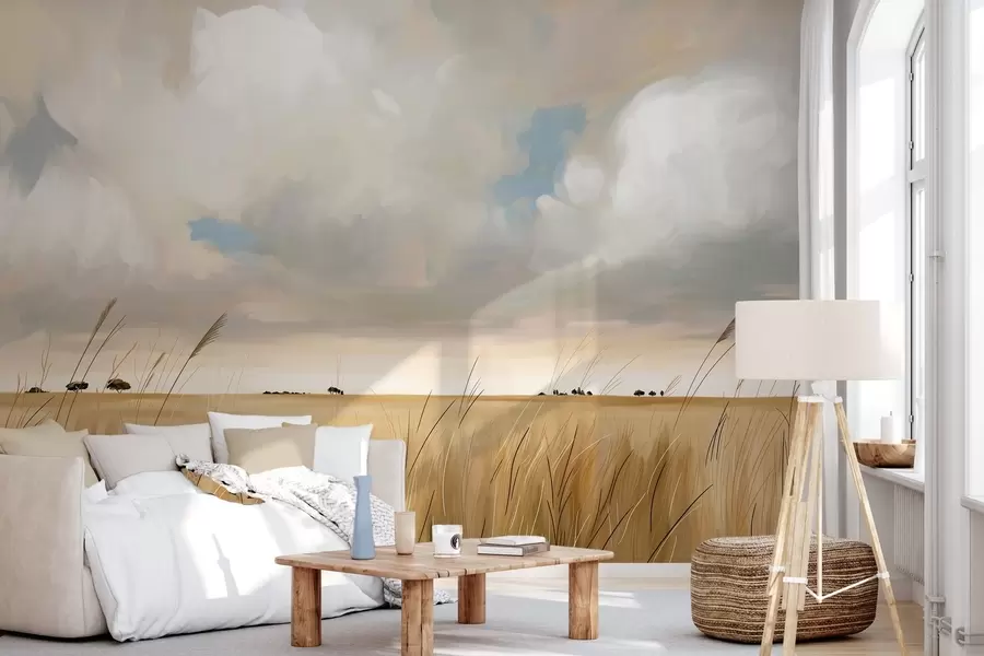 peintures murales Une vue panoramique sur un immense champ d'herbe jaune sous un ciel nuageux w10079